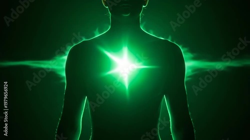 Human Silhouette with Glowing Green Heart Chakra Light