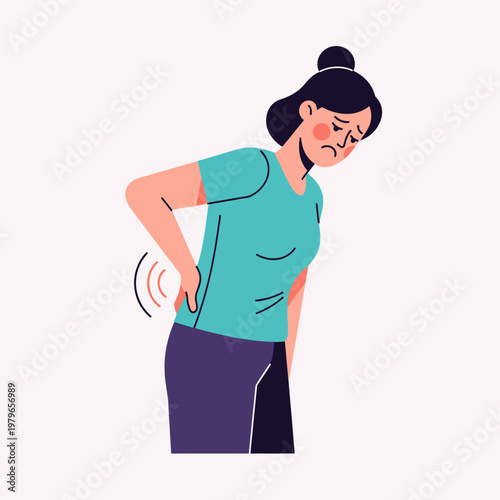 Woman suffering from lower back pain, holding her aching back with a sad expression