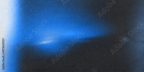 A bright blue moon illuminates the dark sky through a misty rain and smoke texture, creating an artful pattern of light across the storm clouds and ocean water backdrop