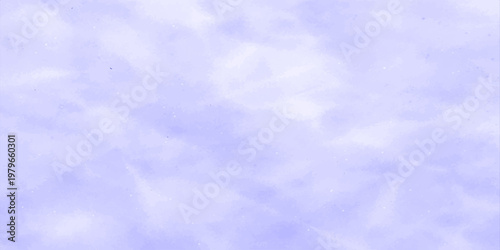 Beautiful fluffy white cumulus clouds drift across a bright clear blue sky on a sunny summer day in this abstract nature cloudscape
