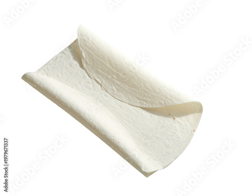 A flat, folded, white, thin, round bread on a white background