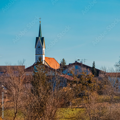 Church on a sunny winter day seen from near Waging am See, Lake Waginger See, Traunstein, Bavaria, Germany