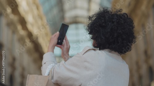 Woman Captures Milan's Galleria Vittorio Emanuele II at Sunrise