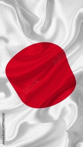 Elegant white silk fabric wave featuring the Japan flag with the red sun disk center.