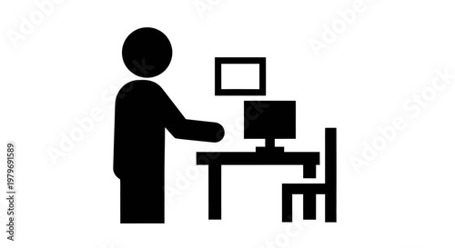 Person working on computer desk.
