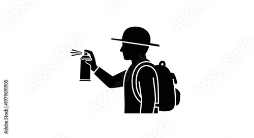 Person wearing backpack spraying can.