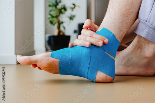 Cuadro en lienzo Wrapping Foot With Kinesiology Tape For Injury