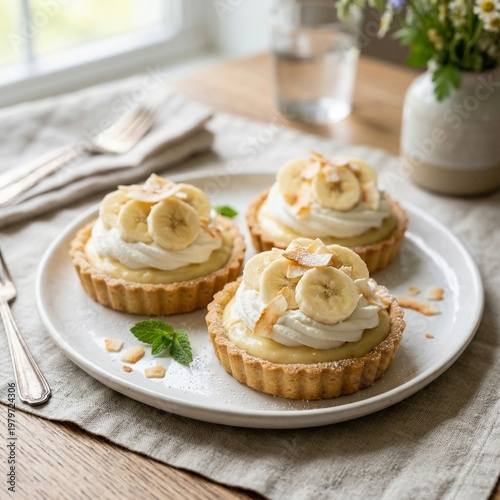 A delicious homemade gourmet apple pie seasoned with fresh mint is served on a white plate as a tasty baked fruit pastry dessert