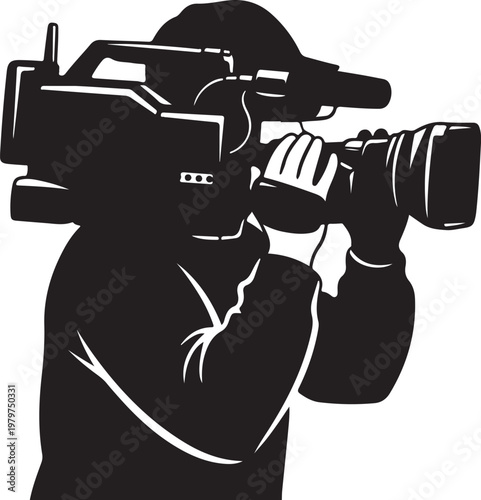Silhouette of a Cameraman Filming with a Large Camera