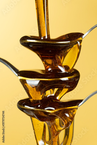 Wallpaper Mural Abstract art of maple syrup flowing over spoons Torontodigital.ca