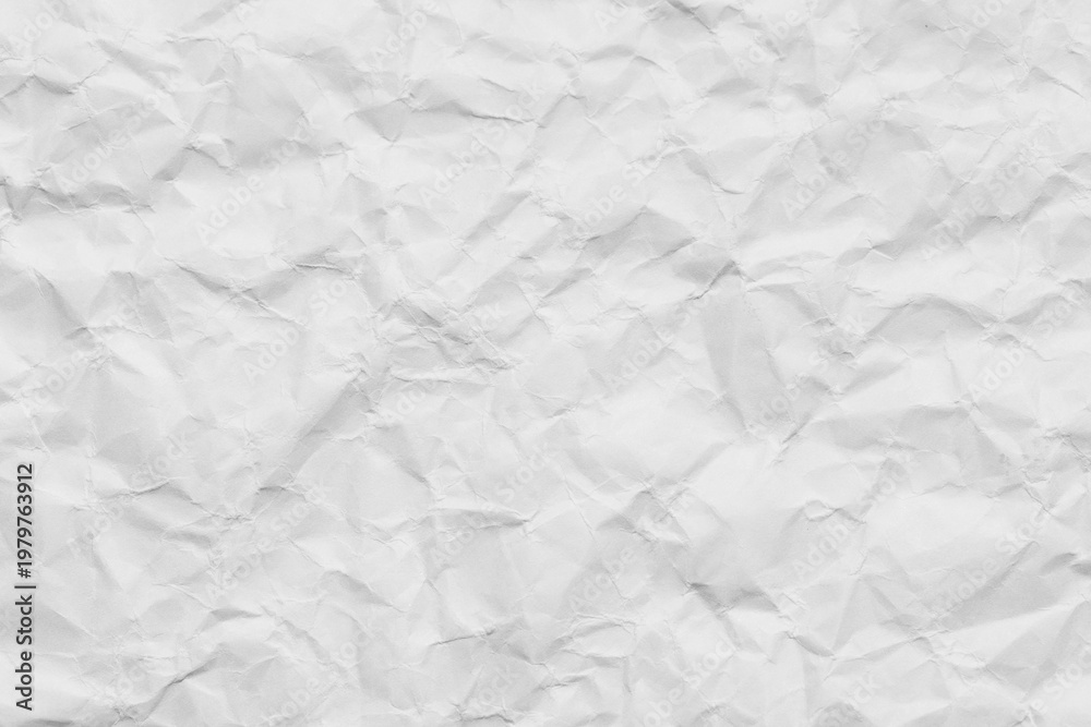 Naklejka premium Crumpled White Paper Texture Background,Top view of a blank, crumpled white paper texture. The wrinkled surface creates subtle shadows and highlights, perfect for use as a background, overlay,Macro