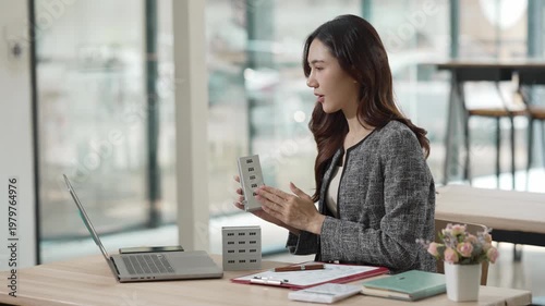 Asian female agents offer pricing and terms for buying or renting real estate, describe interior design options, and provide online home sales consulting.