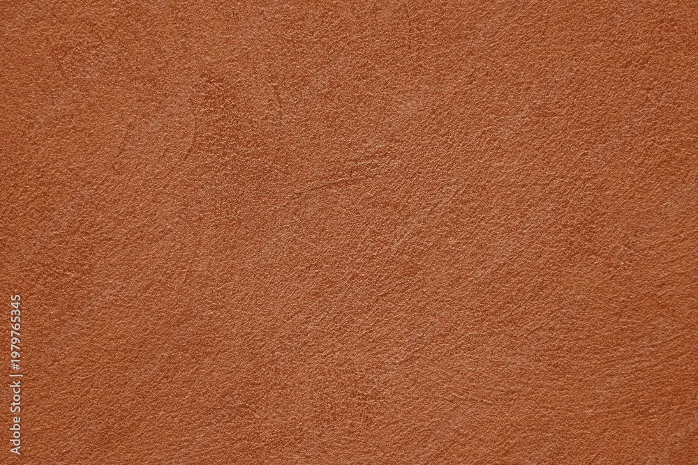 Fototapeta premium peach fuzz pink Wall Texture orange color cement texture background light cement texture Brown cement stucco plaster plastering wall backdrop image Trendy orange color colour