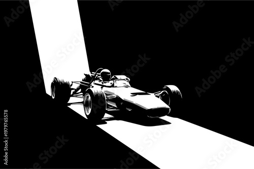 Sleek racing car emerges from shadows, illuminated by stark white light, evoking speed