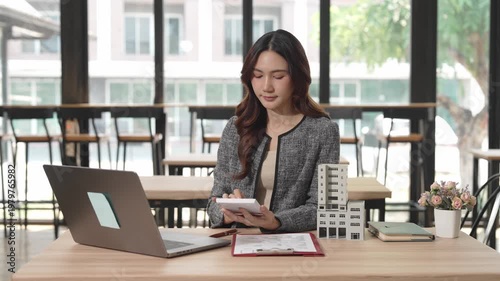 Asian female agents offer pricing and terms for buying or renting real estate, describe interior design options, and provide online home sales consulting.