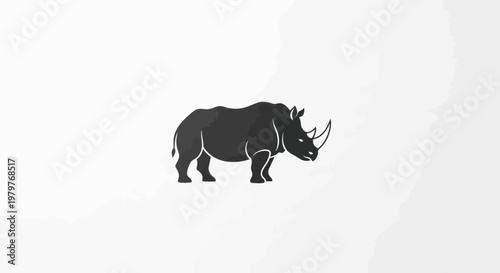 Minimalist dark gray rhino silhouette on a light gray background