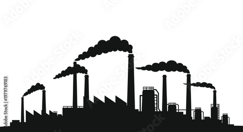 Industrial complex with smokestacks emitting pollution a stark silhouette