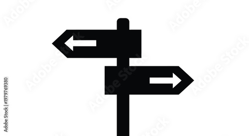 Two directional signs point different ways a stark silhouette