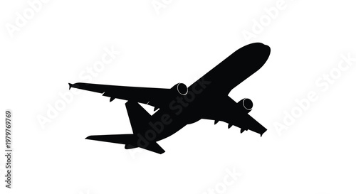 Airplane in flight viewed from below a stark black silhouette