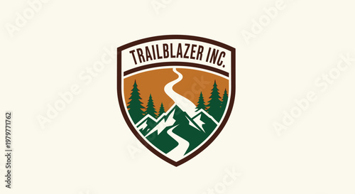 Trailblazer Inc. Logo - Mountain Landscape with Winding River and Trees.