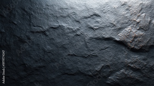 Textured Dark Stone Surface with Natural Patterns and Highlights for Use in Backgrounds, Design Projects or Artistic Applications