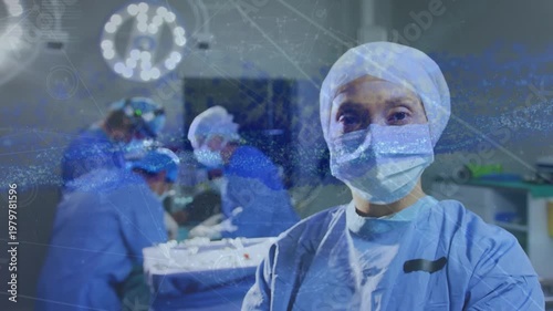 Animation of digital interface over surgeons in operating theatre