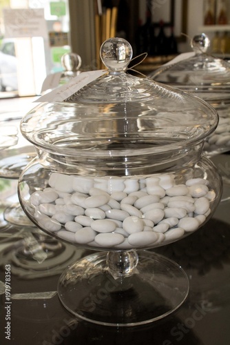 Evocative image of a glass container with confetti for a wedding in Italy