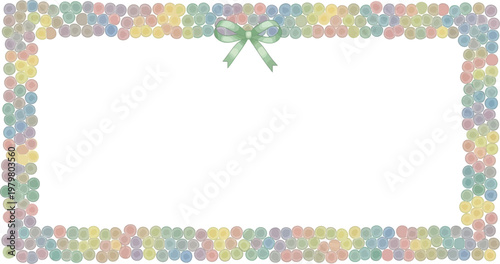 A colorful candy border with a green bow on a white background