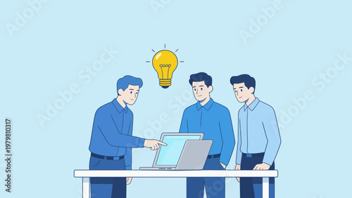 Three men collaborating on a laptop