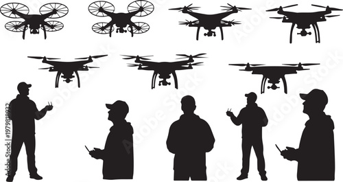 Silhouettes of people operating drones with controllers in hand