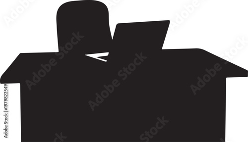 Man sitting in a cardboard box with laptop computer