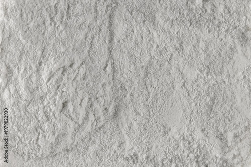 Macro view of white cosmetic powder texture for skincare background