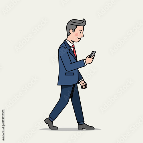 Businessman walking and looking at his smartphone.