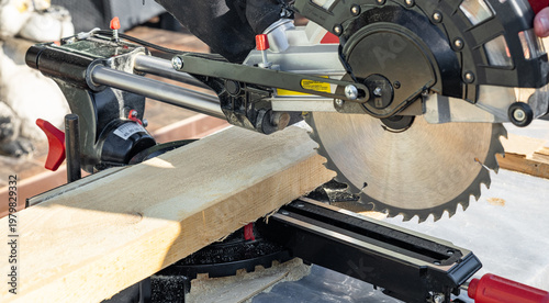 Tableau sur toile Miter saw tool blade up close for cutting lumber and carpentry