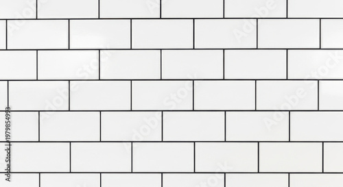 Clean white subway tile pattern with dark grout for a modern and minimalist background