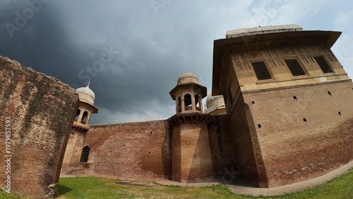 Historic Red Brick Rear Exterior Wall and Architectural Domes of Sheikh Chilli Tomb under Cloudy Rainy Weather in Kurukshetra