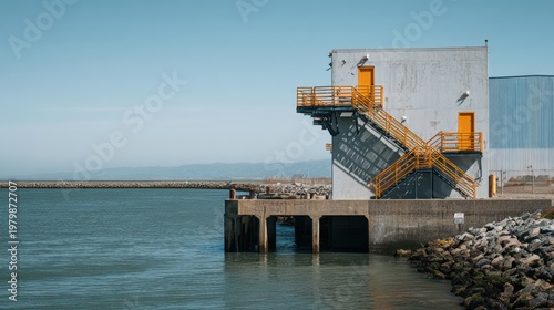 Industrial Dockside Structure with Staircase by Calm Waterscape