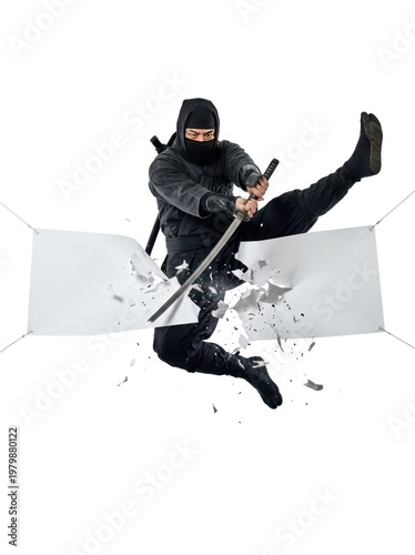 Ninja strikes a banner with a sword, dramatic action shot.