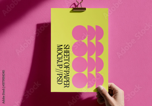 Hand Holding Poster Sheet Mockup