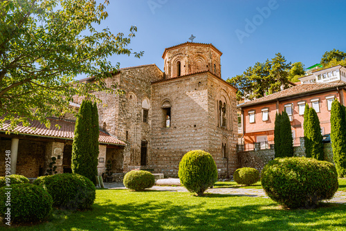 Tableau sur toile Historic Orthodox Church of Hagia Sophia  with Green Garden on a Sunny Day