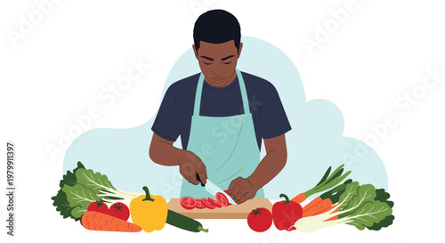 Young black man wearing apron cutting fresh tomatoes on a wooden board for healthy meal preparation in kitchen.