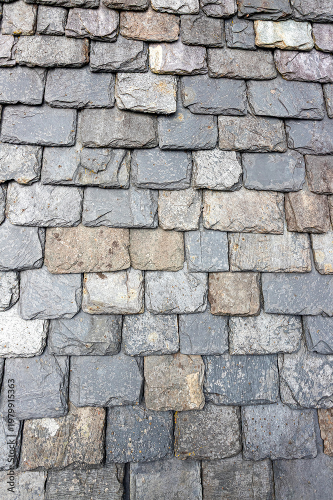 Naklejka premium Traditional local stone tiles on the roof of Skipness Castle on the north east coast of the Kintyre Peninsula, Argyll & Bute, Scotland UK