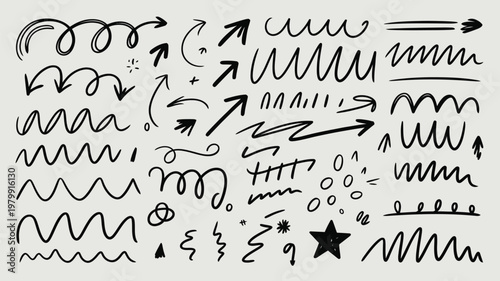 Collection of hand drawn arrows lines and scribbles on a white background