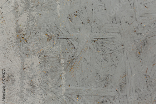 Old painted wooden oriented strand board (OSB) plywood background. Vintage rough texture.