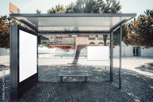 Modern bus stop mockup with blank poster panel and empty route map display, urban shelter template on cobblestone pavement, glass structure, bench and sunny street background