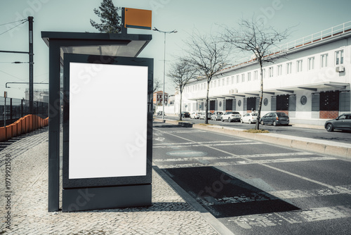 Blank bus stop billboard mockup on urban roadside, vertical outdoor advertising template beside transit lane, with copy space, modern shelter structure and clean city street background