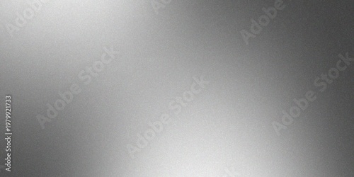 Sleek silver metallic background with a fine grainy texture and smooth gradient light reflections.