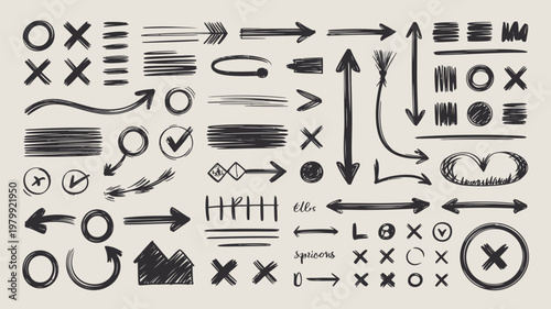 Photos Collection of hand drawn arrows scribbles and design elements on a white backgro