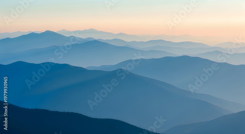 Serene mountain vista a pastel sunrise over layered peaks