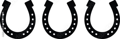 Three Black Horseshoe Silhouettes with Nail Holes on White Background luck good luck